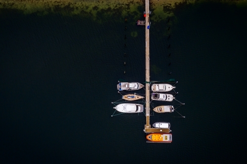 Aerial of boats anchored at Jetty - Australian Stock Image
