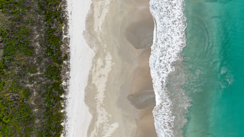 Aerial of bushes, sand and water - Australian Stock Image
