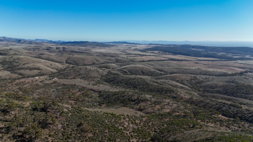 Aerial of remote ranges for as long as the eye can see - Australian Stock Image