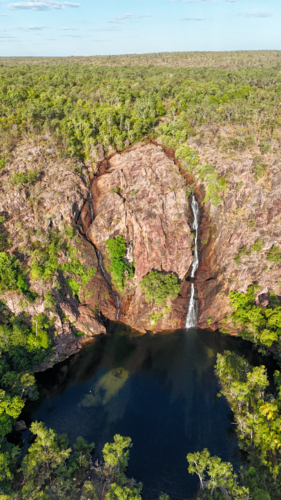 Aerial of two waterfalls leading to a swimming spot - Australian Stock Image