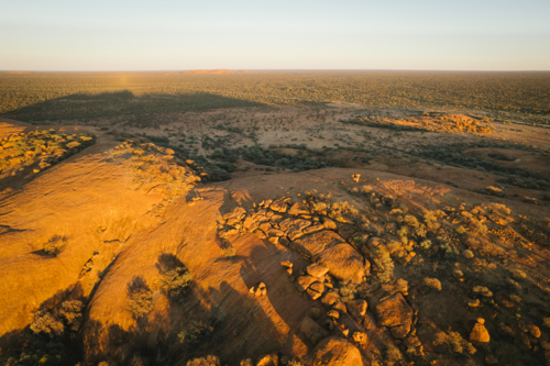 Aerial of Walgahna Walga Rock at sunset near Cue Western Australia - Australian Stock Image