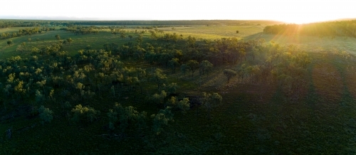 Aerial panorama of a farm paddock at dusk. - Australian Stock Image