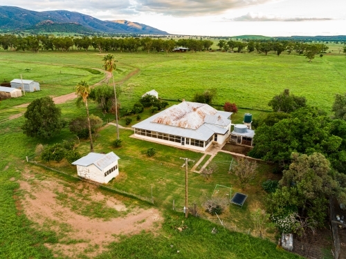 Aerial photo of farm homestead in morning, grass is green after rain - Australian Stock Image