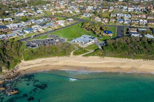 Aerial scene capturing the Cape Hawke Surf Life Saving Club near Forster, NSW, Australia - Australian Stock Image