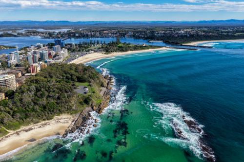 Aerial scene capturing the coastline of Forster, NSW, Australia, featuring Pebbly Beach - Australian Stock Image
