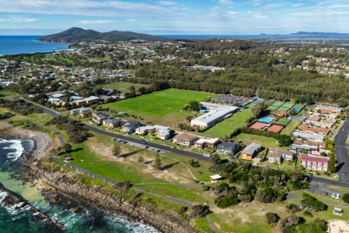 Aerial scene capturing The Tanks coastline and the Forster Sporting Complex in Forster, NSW. - Australian Stock Image