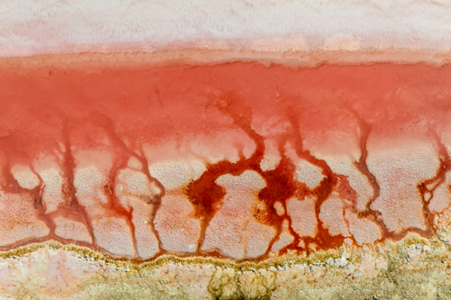 Aerial series of abstract pink salt crusts and mineral textures at Hutt Lagoon - Australian Stock Image