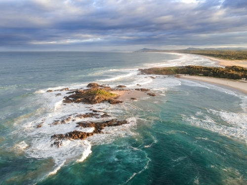 Aerial shot of Sawtell beach in the afternoon