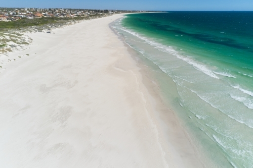 Aerial shot of the sandy beach and water at Mullaloo Beach in Perth, Western Australia - Australian Stock Image
