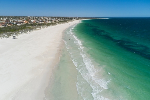 Aerial view along the waves and sand at Mullaloo Beach in Perth, Western Australia - Australian Stock Image