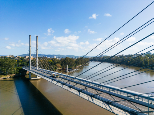 Aerial view looking across the Eleanor Schonell Bridge as a bus passes over - Australian Stock Image