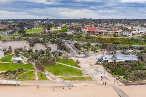 Aerial view of a car park and a large coastal reserve at the beach - Australian Stock Image