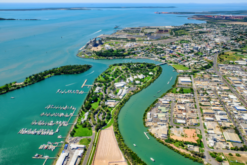 Aerial view of a coastal marina and surrounding waterways - Australian Stock Image