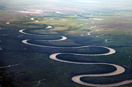 Aerial view of a curving river system