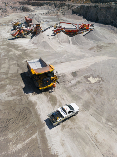 Aerial view of a dump truck in a quarry. - Australian Stock Image
