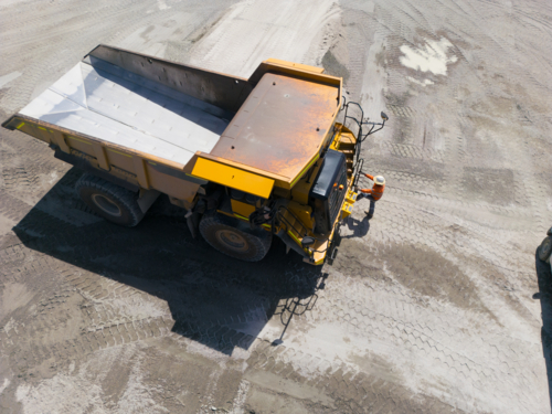 Aerial view of a dump truck in a quarry. - Australian Stock Image