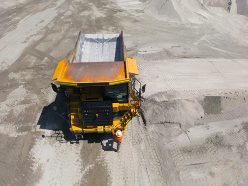 Aerial view of a dump truck in an open cut mine - Australian Stock Image