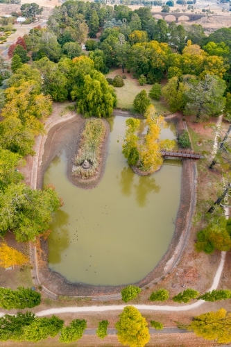 Aerial view of a garden lake with islands in Autumn - Australian Stock Image