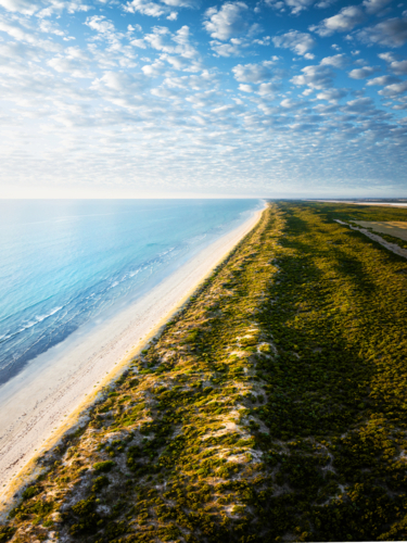 Aerial view of a pristine long stretch of The Granites coastline - Australian Stock Image