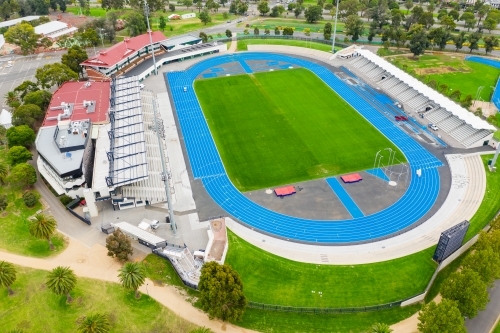 Aerial view of a sporting arena and surrounding parkland - Australian Stock Image