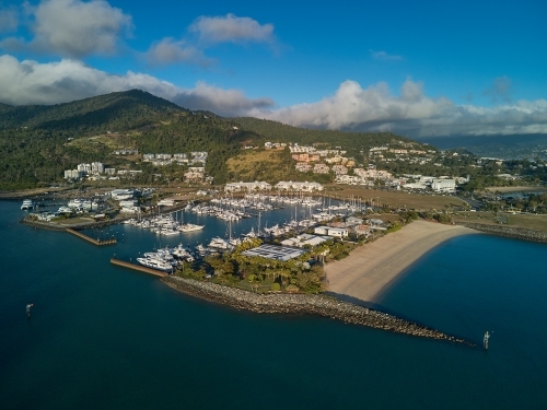 Aerial view of Airlie Beach across marina.