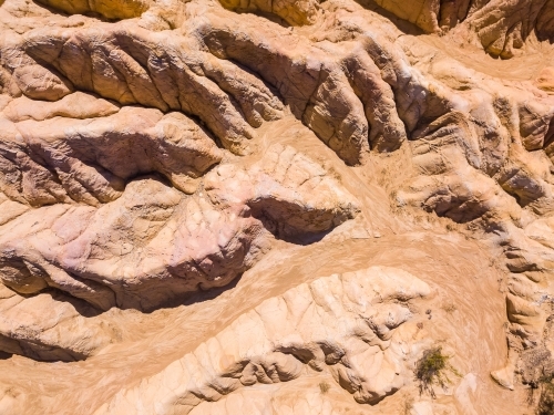 Aerial view of barren hills and gullies caused by erosion