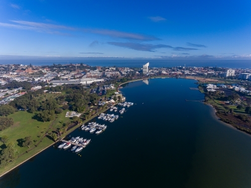 aerial view of Bunbury from the inlet looking towards the city centre and ocean - Australian Stock Image