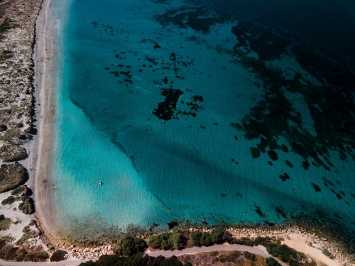 Aerial view of clear ocean and shoreline at Woodman Point