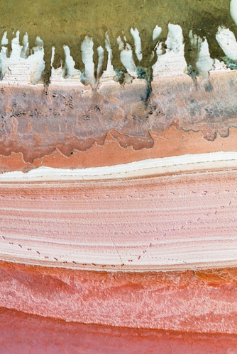 Aerial view of colorful salt lake patterns with layered mineral textures. - Australian Stock Image