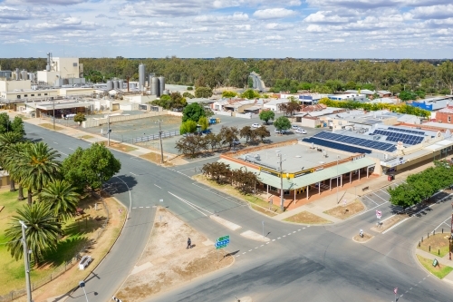 Aerial view of crossroads in a regional town and surrounding buildings - Australian Stock Image