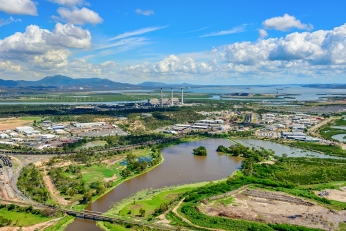 Aerial view of East Gladstone, creeks and power station - Australian Stock Image
