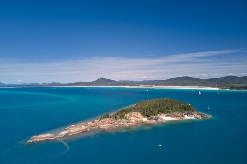 Aerial view of Esk Island looking toward Whitehaven Beach. - Australian Stock Image