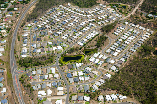 Aerial view of Gladstone from Kirkwood area looking towards Curtis Island - Australian Stock Image