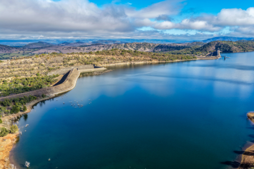 Aerial view of Glenbawn Dam and the spillway with surrounding landscape in NSW Australia. - Australian Stock Image