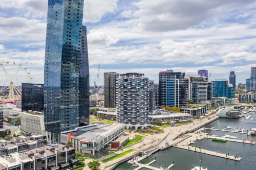 Aerial view of high rise buildings on a marina waterfront - Australian Stock Image