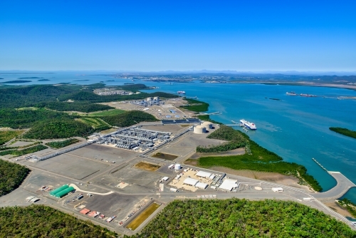 Aerial view of liquified natural gas plant and LNG ship on Curtis Island, Queensland - Australian Stock Image