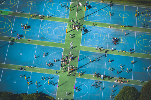 Aerial view of multiple outdoor netball courts - Australian Stock Image