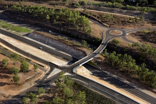 Aerial view of new roads surrounded by bushland - Australian Stock Image