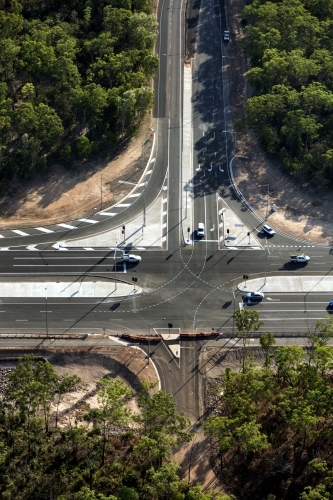 Aerial view of new roads surrounded by bushland - Australian Stock Image