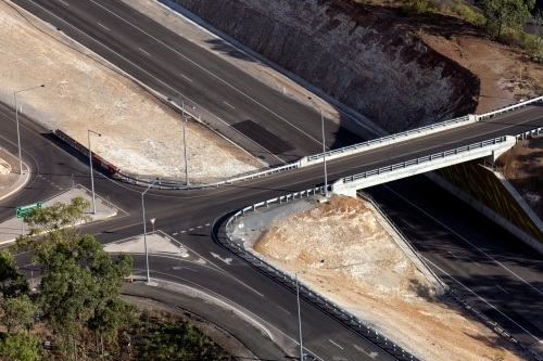 Aerial view of new roads surrounded by bushland - Australian Stock Image