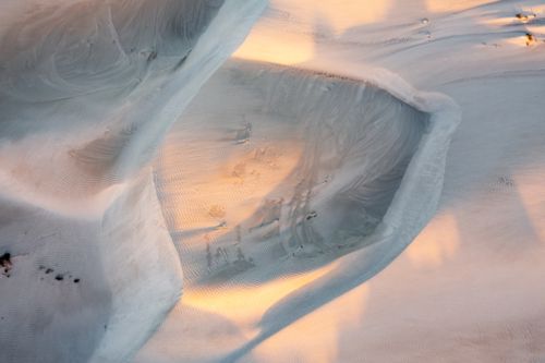 Aerial view of patterns and drift deatils of white sand dunes - Australian Stock Image