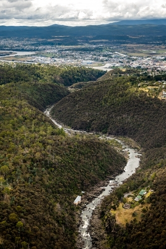 Aerial view of river running through bushland