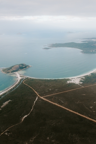 Aerial view of roads leading to coastline