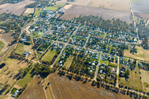Aerial view of Rupanyup township surrounded by dry farmland and open plains. - Australian Stock Image