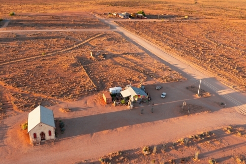 Aerial view of scattered buildings in a arid desert landsacpe