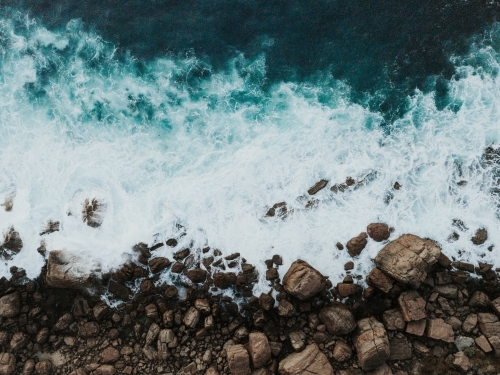 Aerial view of small section of rocky coastline - Australian Stock Image