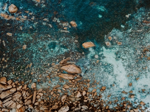 Aerial view of small section of rocky coastline