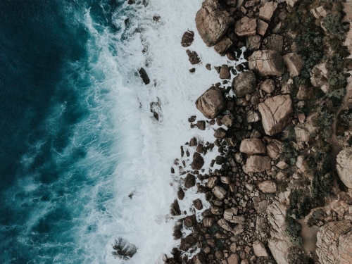 Aerial view of small section of rocky coastline - Australian Stock Image