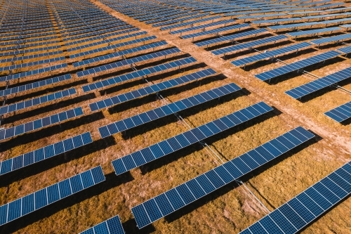Aerial view of solar farm panels for renewable energy. - Australian Stock Image
