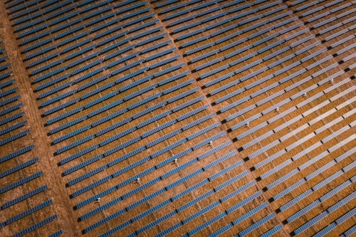 Aerial view of solar farm panels for renewable energy. - Australian Stock Image